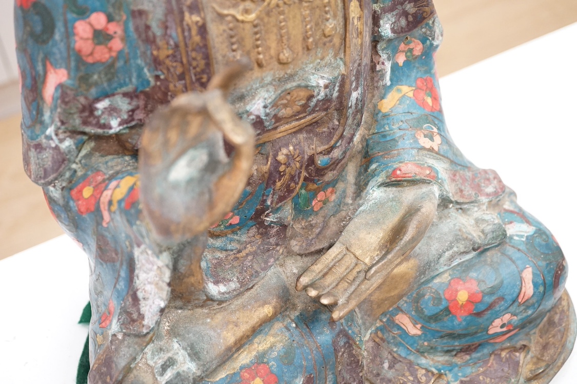 A large Chinese cloisonné enamelled bronze figure of Guanyin, 43cm high. Condition - some damage to edging of garment